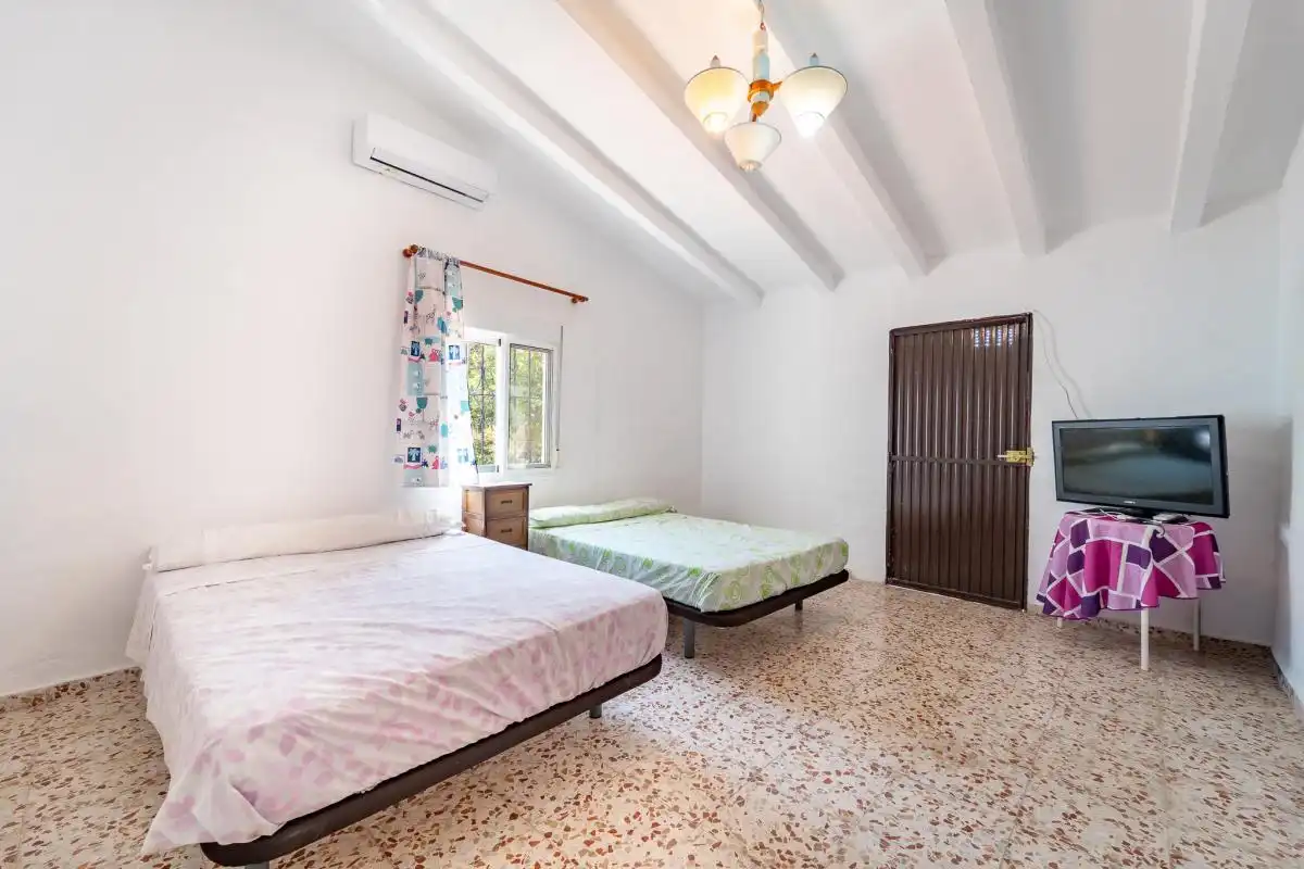 Habitación de Casa adosada en venta en Frigiliana con Aire acondicionado, Calefacción y Jardín privado