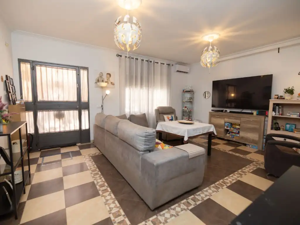 Sala d'estar de Casa o xalet en venda en La Rinconada