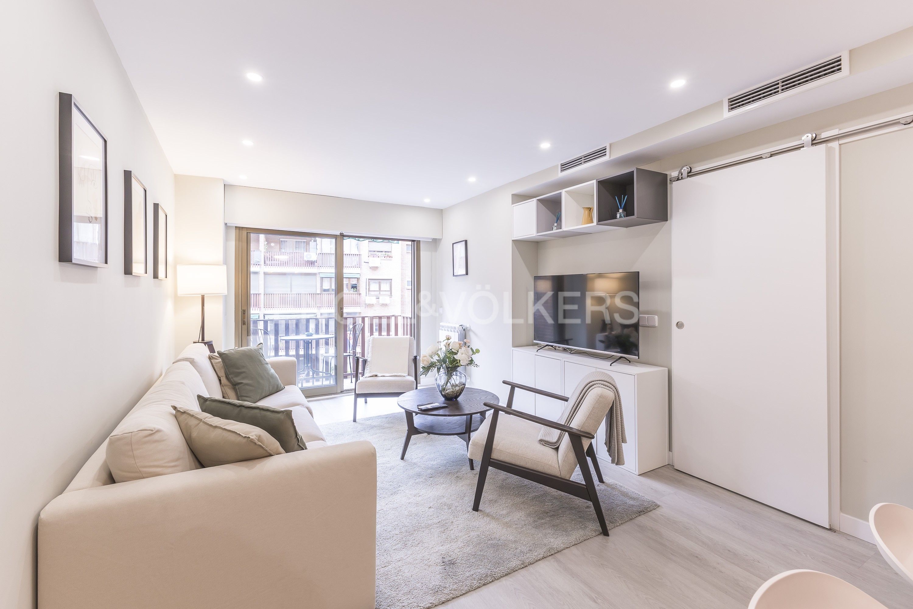 Living room of Apartment for sale in  Madrid Capital  with Air Conditioner, Heating and Balcony