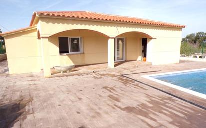 Vista exterior de Casa o xalet en venda en Llagostera amb Calefacció, Jardí privat i Piscina