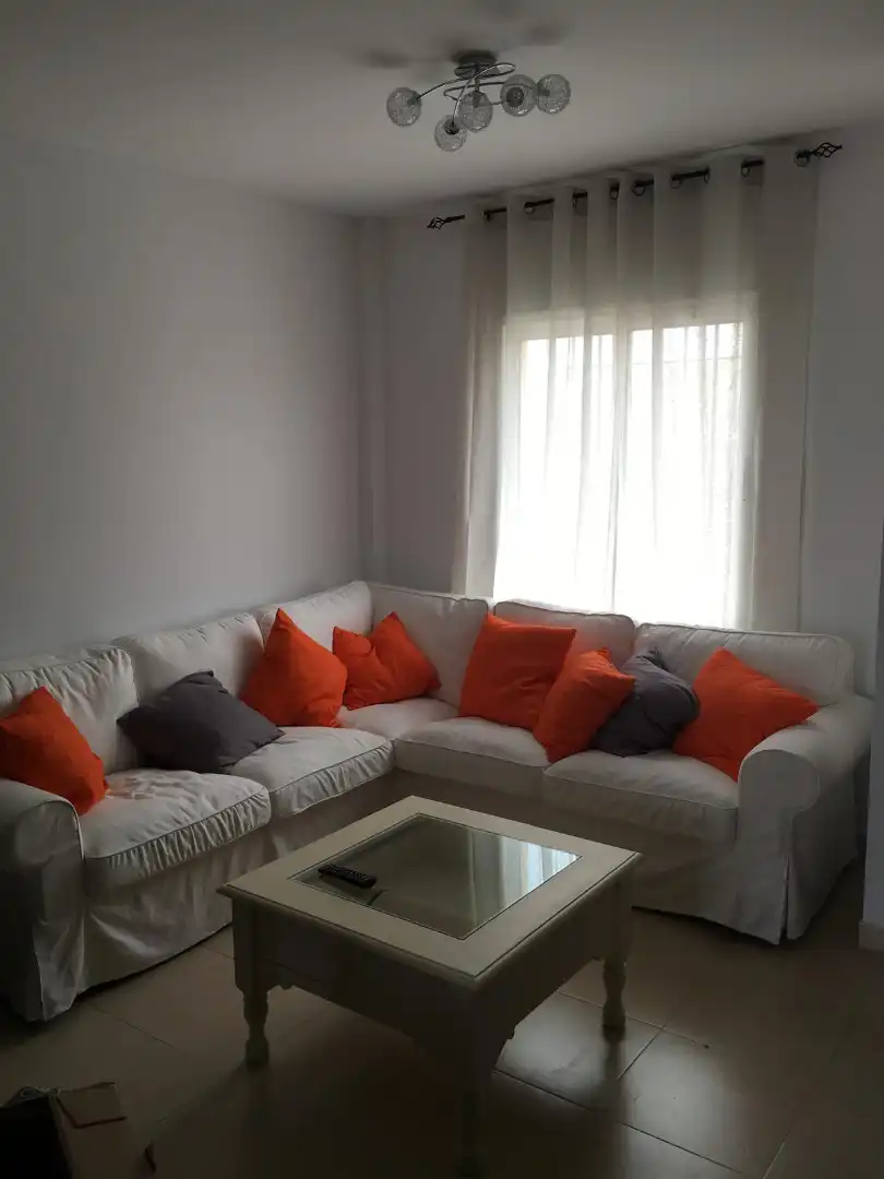 Sala d'estar de Casa adosada en venda en Vélez-Málaga amb Aire condicionat, Terrassa i Moblat