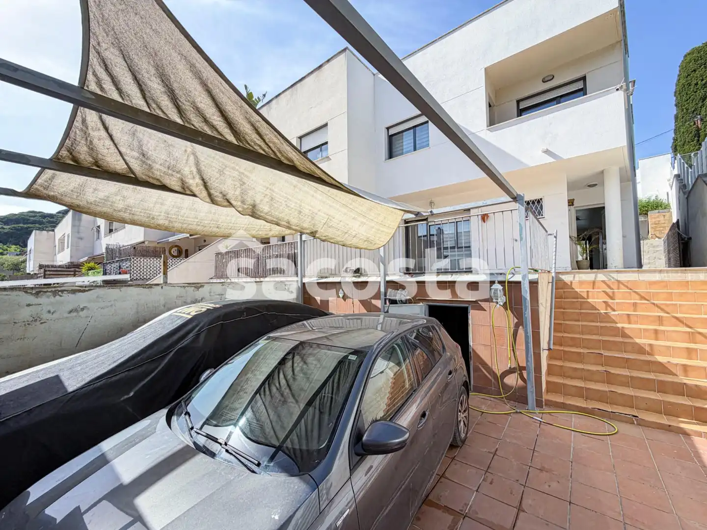 Vista exterior de Casa adosada en venda en Canet de Mar amb Calefacció, Jardí privat i Terrassa