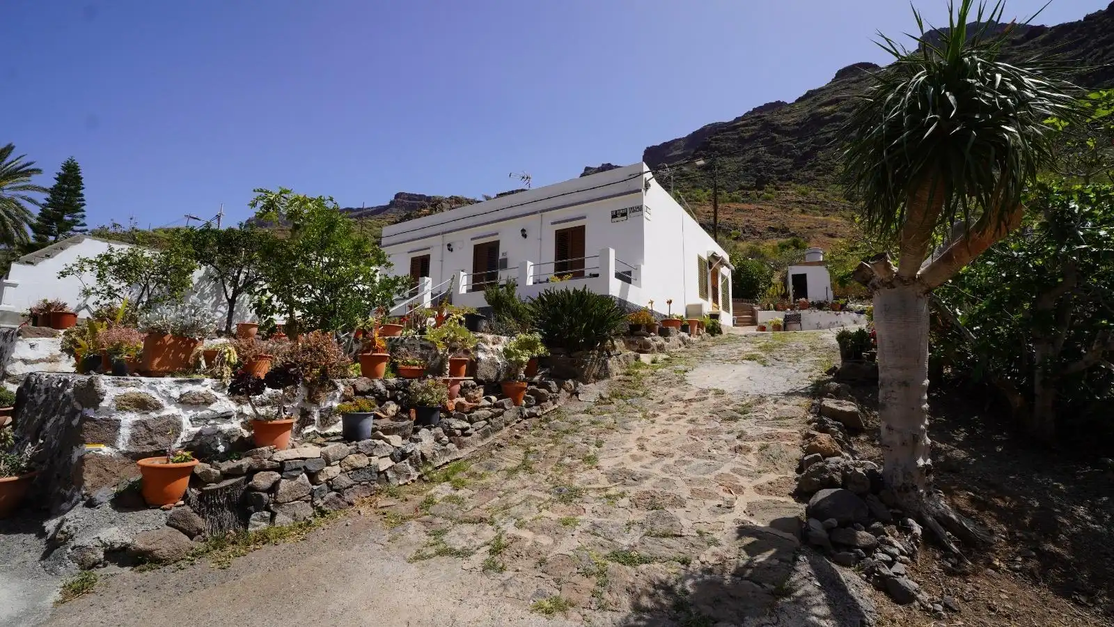 Vista exterior de Casa o xalet en venda en Mogán amb Jardí privat, Terrassa i Traster