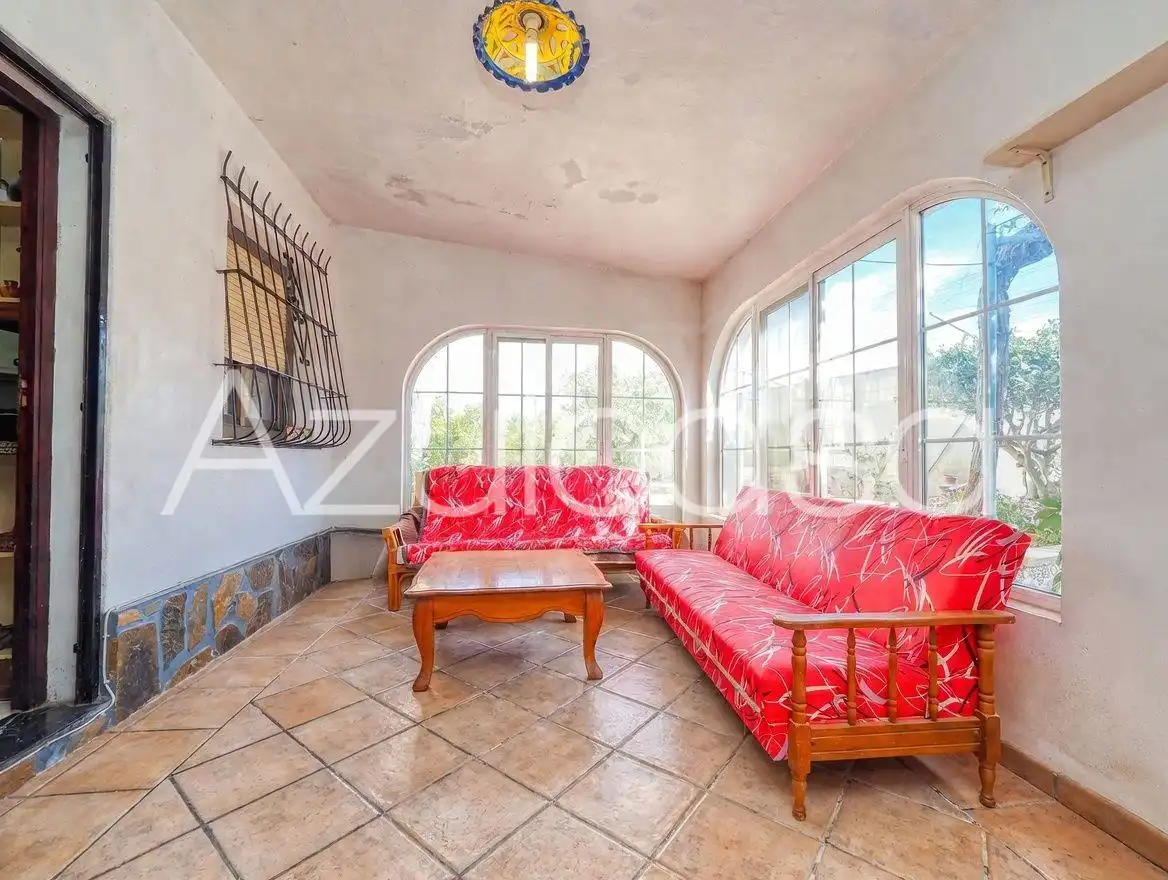 Sala d'estar de Casa o xalet en venda en Busot amb Aire condicionat, Traster i Piscina