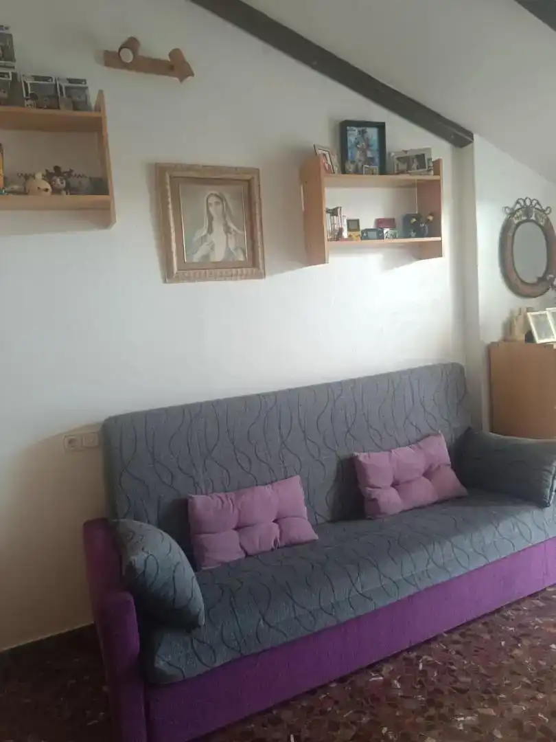 Sala d'estar de Casa adosada en venda en Alcalá la Real amb Aire condicionat i Balcó
