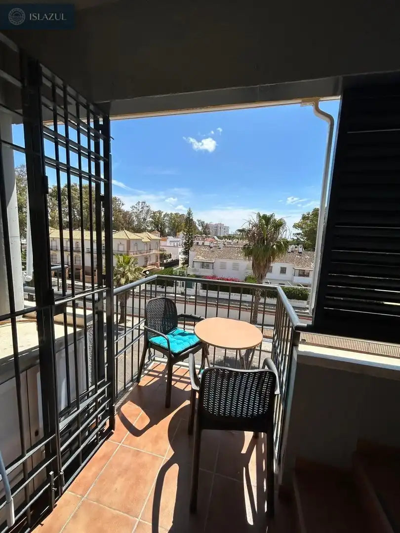 Terrassa de Pis de lloguer en Isla Cristina amb Aire condicionat, Jardí privat i Terrassa