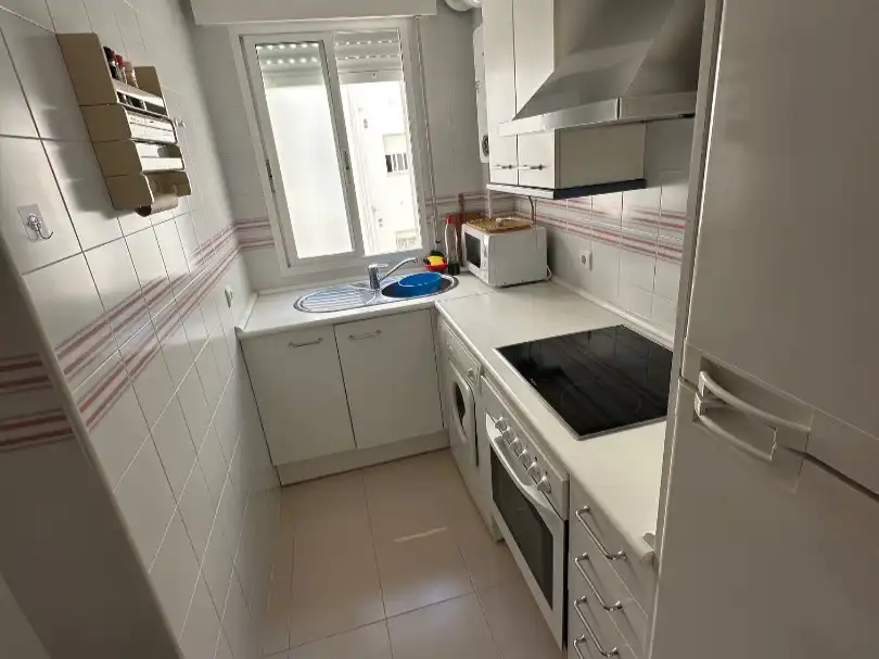 Cocina de Apartamento de alquiler en El Portil con Jardín privado, Terraza y Piscina