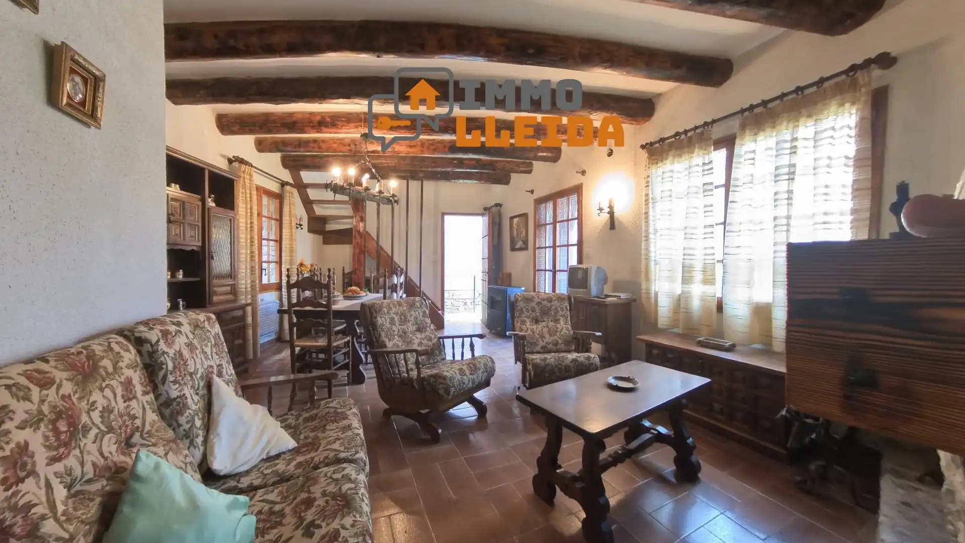 Sala de estar de Casa adosada en venta en Àger con Calefacción, Terraza y Amueblado