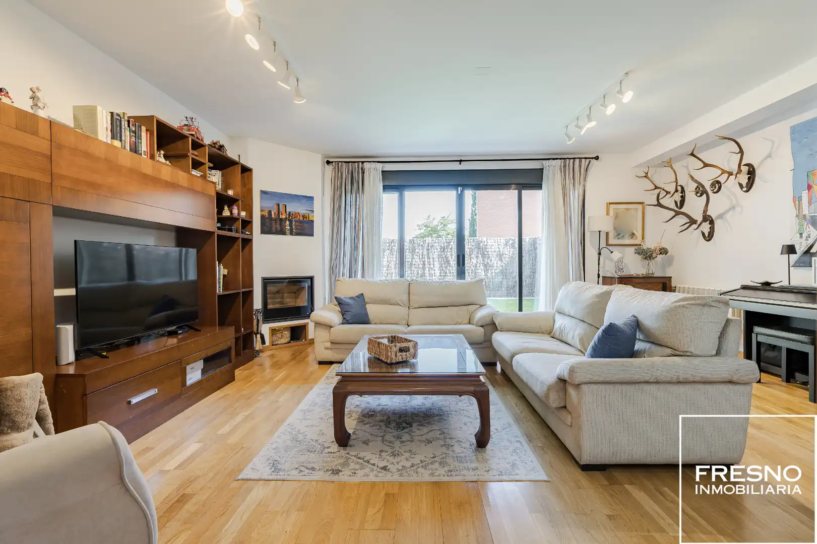 Sala de estar de Casa adosada en venta en Miramadrid