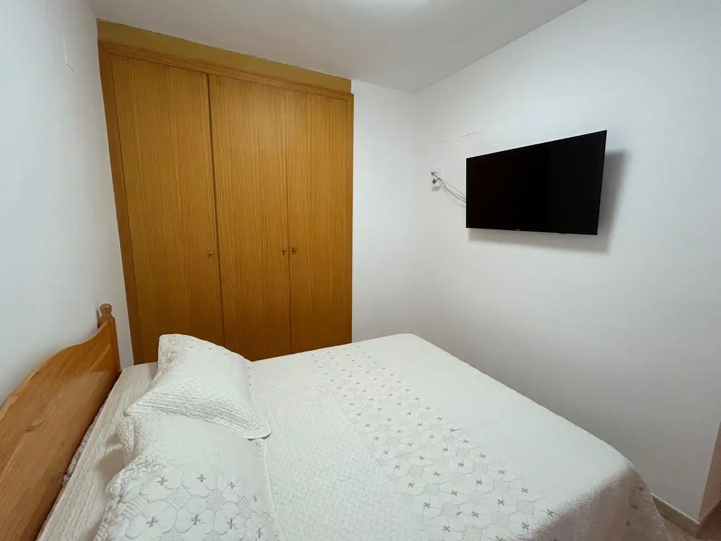 Schlafzimmer von Einfamilien-Reihenhaus zum Verkauf in Cullera mit Klimaanlage, Terrasse und Möbliert
