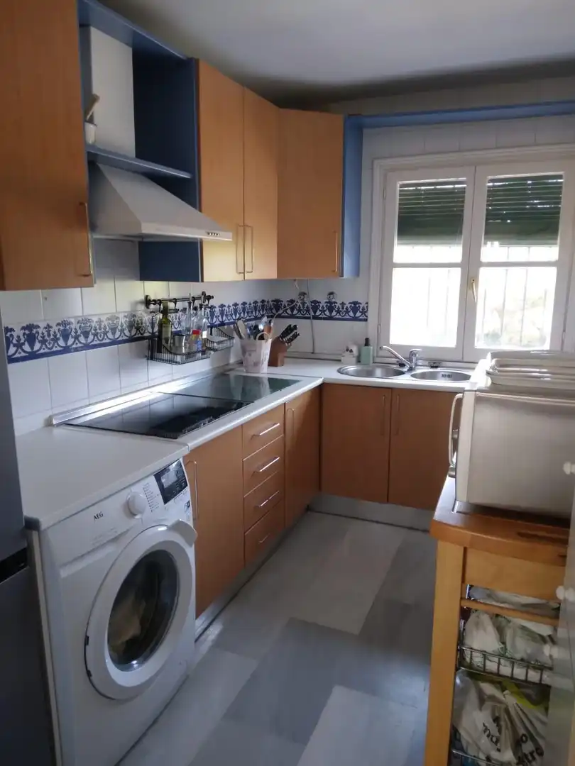 Cocina de Casa adosada en venta en Chiclana de la Frontera con Jardín privado y Piscina comunitaria