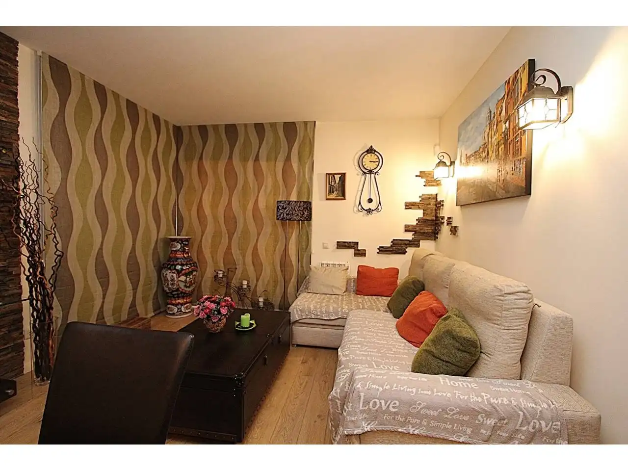 Wohnzimmer von Wohnung zum Verkauf in Lloret de Mar mit Klimaanlage, Heizung und Privatgarten