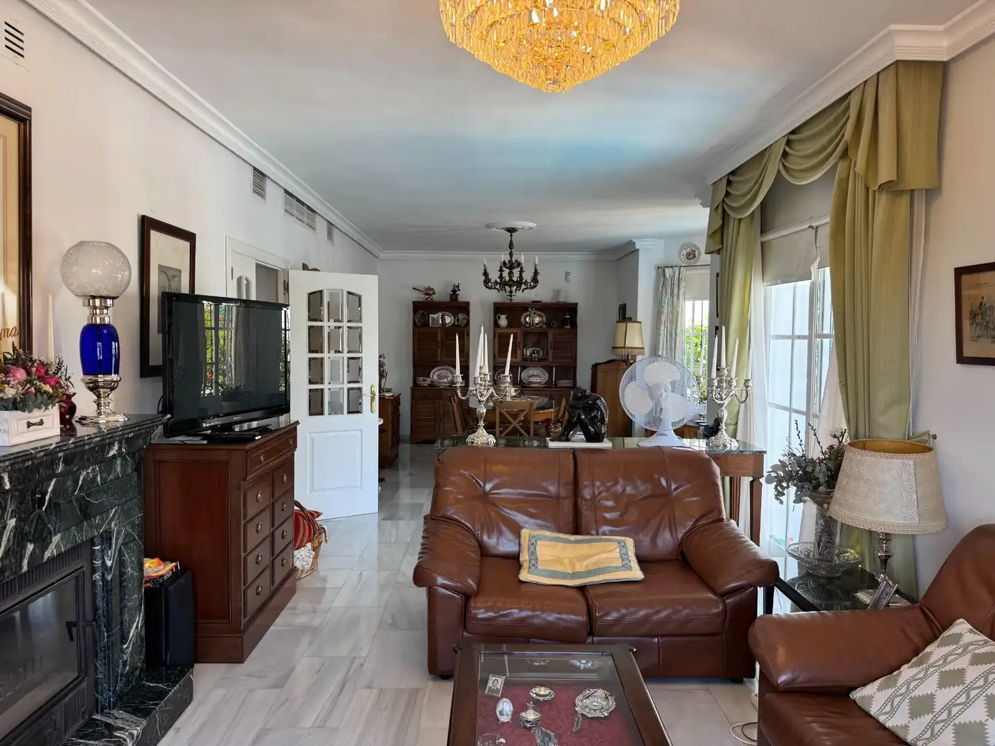 Sala d'estar de Casa adosada en venda en Málaga amb Aire condicionat, Calefacció i Jardí privat