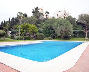 Swimming pool of Single-family semi-detached for sale in Benalmádena  with Air Conditioner, Terrace and Furnished
