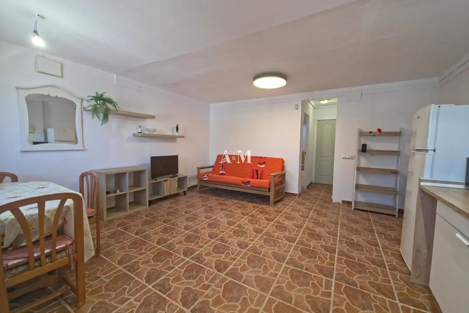 Sala d'estar de Casa adosada de lloguer en Torrevieja amb Aire condicionat, Calefacció i Jardí privat