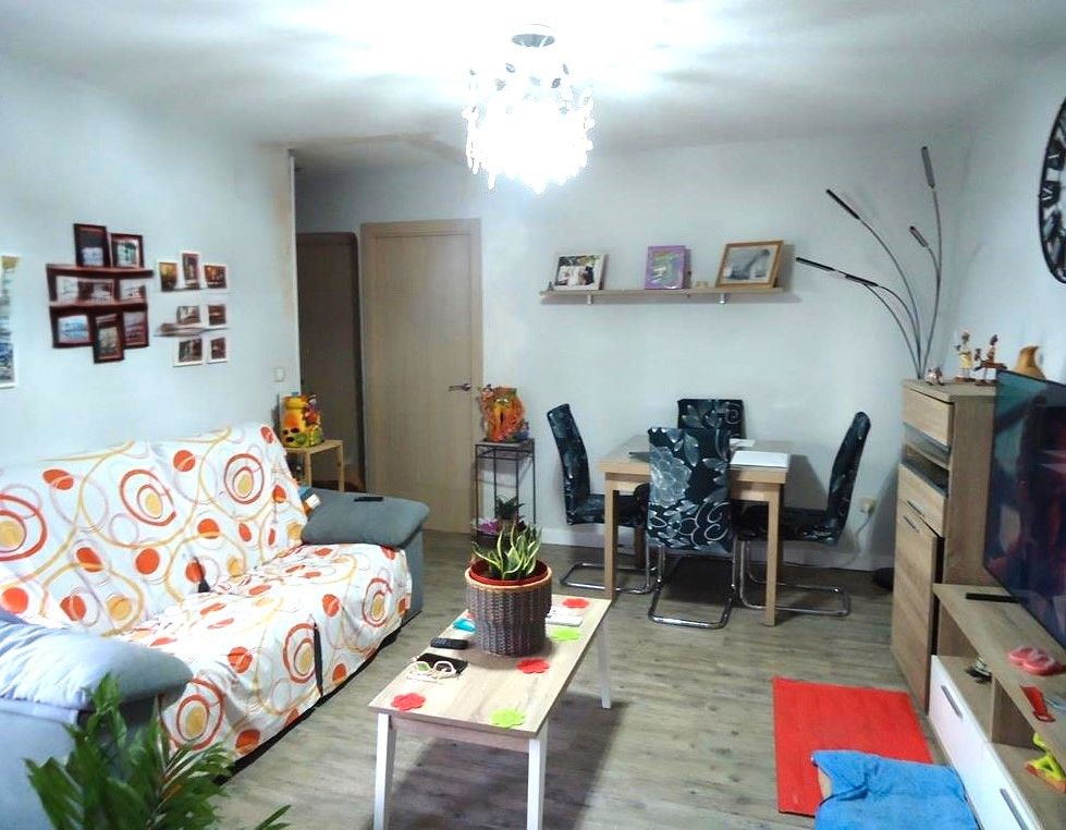 Living room of Flat for sale in  Madrid Capital  with Air Conditioner, Heating and Balcony