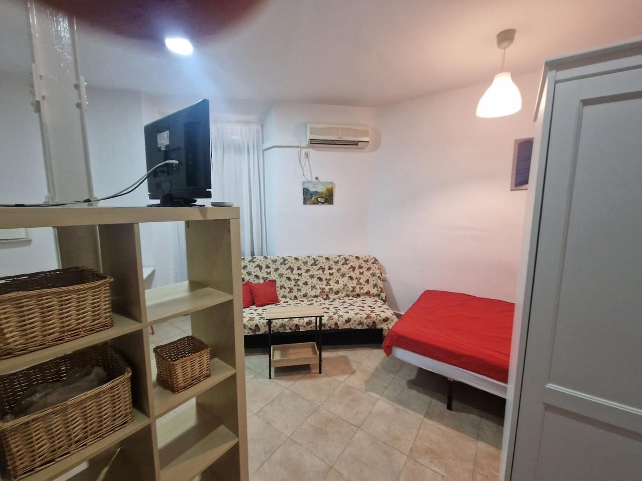 Sala d'estar de Estudi de lloguer en  Sevilla Capital amb Moblat