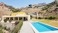 Vista exterior de Casa o xalet en venda en Torrox amb Aire condicionat i Piscina