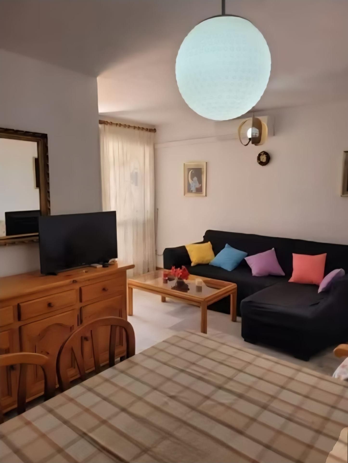 Sala d'estar de Pis en venda en Torremolinos amb Aire condicionat, Jardí privat i Terrassa