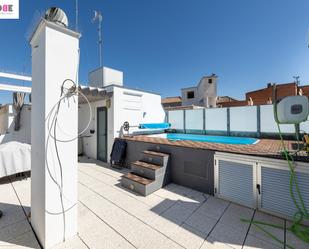 Swimming pool of Attic for sale in  Granada Capital  with Air Conditioner, Terrace and Swimming Pool