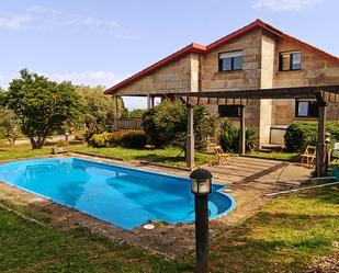 Swimming pool of House or chalet for sale in Sanxenxo  with Heating, Private garden and Parquet flooring