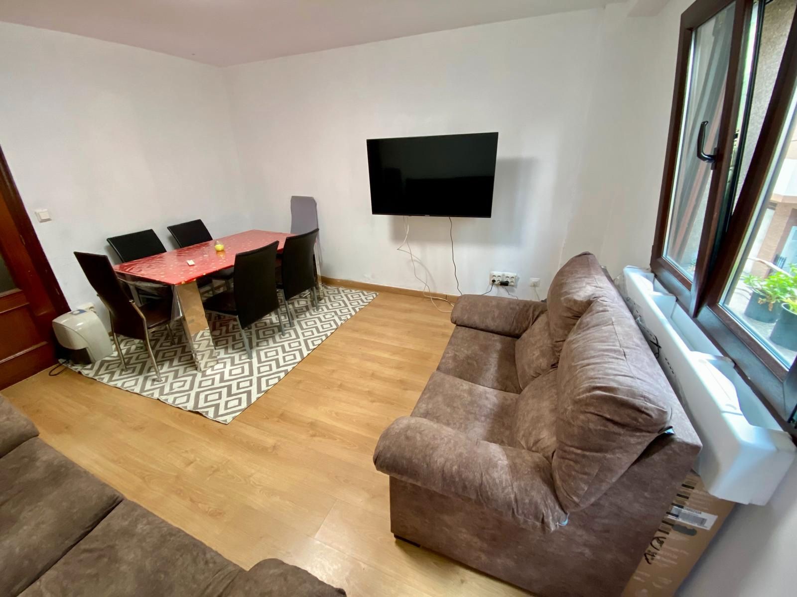 Living room of Flat for sale in Gijón   with Parquet flooring, Oven and Washing machine