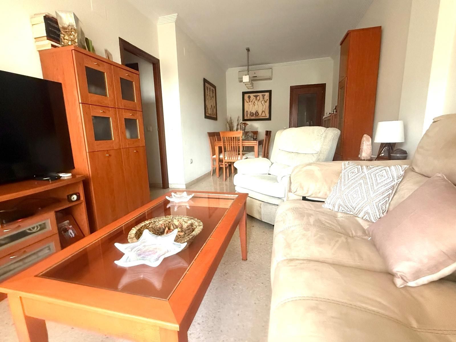 Living room of Flat for sale in  Sevilla Capital  with Private garden, Terrace and Storage room