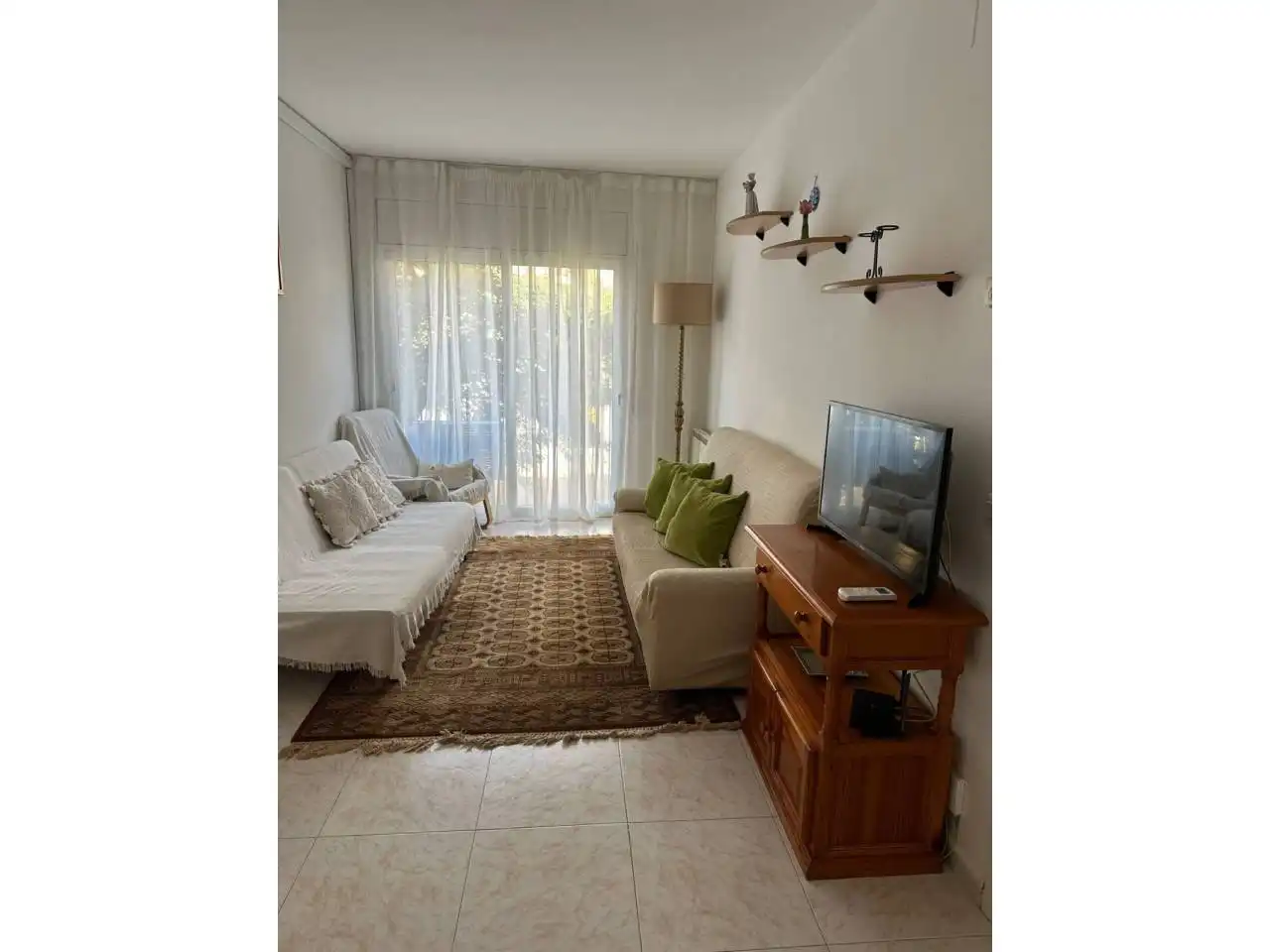 Living room of Flat for sale in Lloret de Mar  with Heating, Furnished and Balcony
