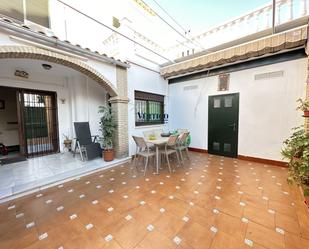 Exterior view of Single-family semi-detached for sale in Dos Hermanas  with Air Conditioner, Heating and Terrace