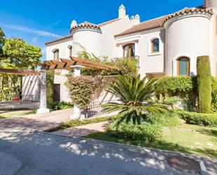 Exterior view of Single-family semi-detached for sale in Estepona  with Air Conditioner, Terrace and Swimming Pool