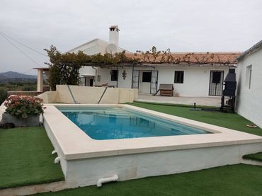 Casa rústica amb jardí en venda a Vía Diseminados