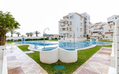 Swimming pool of Flat for sale in Roquetas de Mar  with Terrace and Community pool