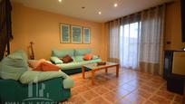 Sala d'estar de Casa adosada en venda en La Vall d'Uixó amb Aire condicionat, Terrassa i Balcó