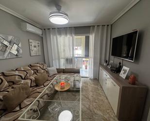 Living room of Flat for sale in  Sevilla Capital