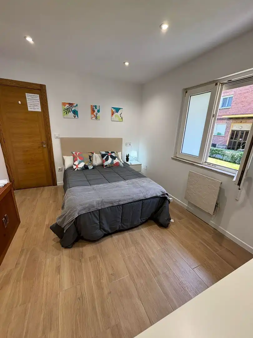 Bedroom of Flat for sale in Gijón   with Heating, Storage room and Swimming Pool