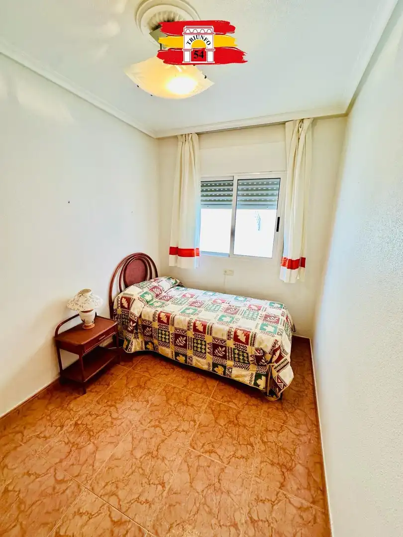 Habitación de Casa adosada en venta en Pilar de la Horadada con Aire acondicionado, Terraza y Amueblado