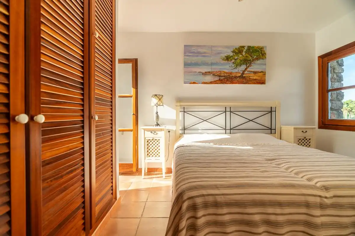 Schlafzimmer von Dachboden zum Verkauf in Santa Eulària des Riu mit Klimaanlage, Heizung und Schwimmbad