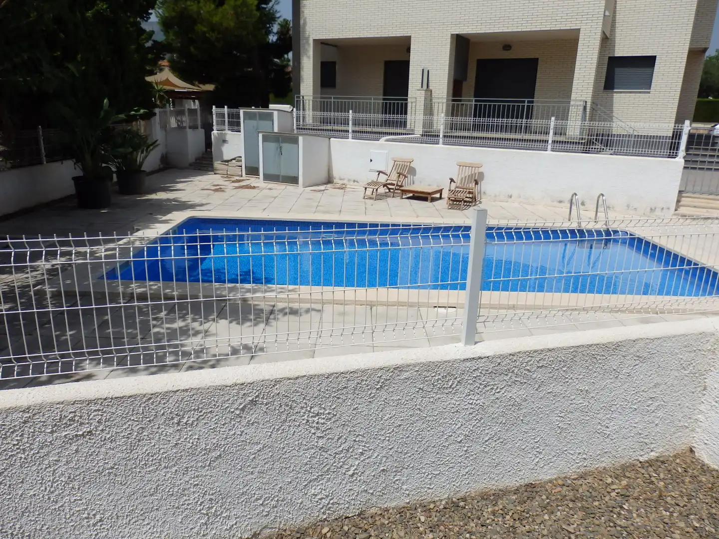Schwimmbecken von Einfamilien-Reihenhaus zum Verkauf in Mont-roig del Camp mit Klimaanlage, Privatgarten und Terrasse