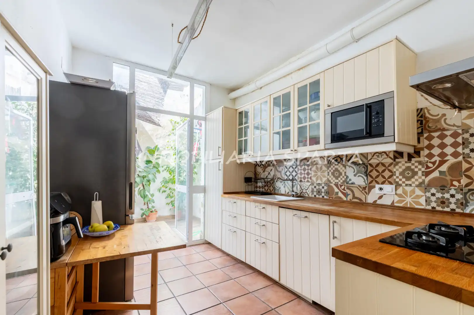 Cocina de Casa adosada en venta en Gelves con Terraza, Horno y Lavadora
