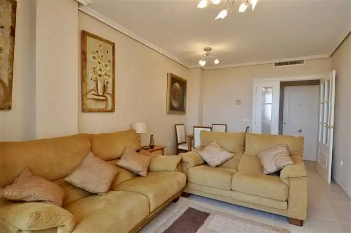 Sala d'estar de Apartament en venda en Calpe / Calp amb Aire condicionat, Calefacció i Jardí privat