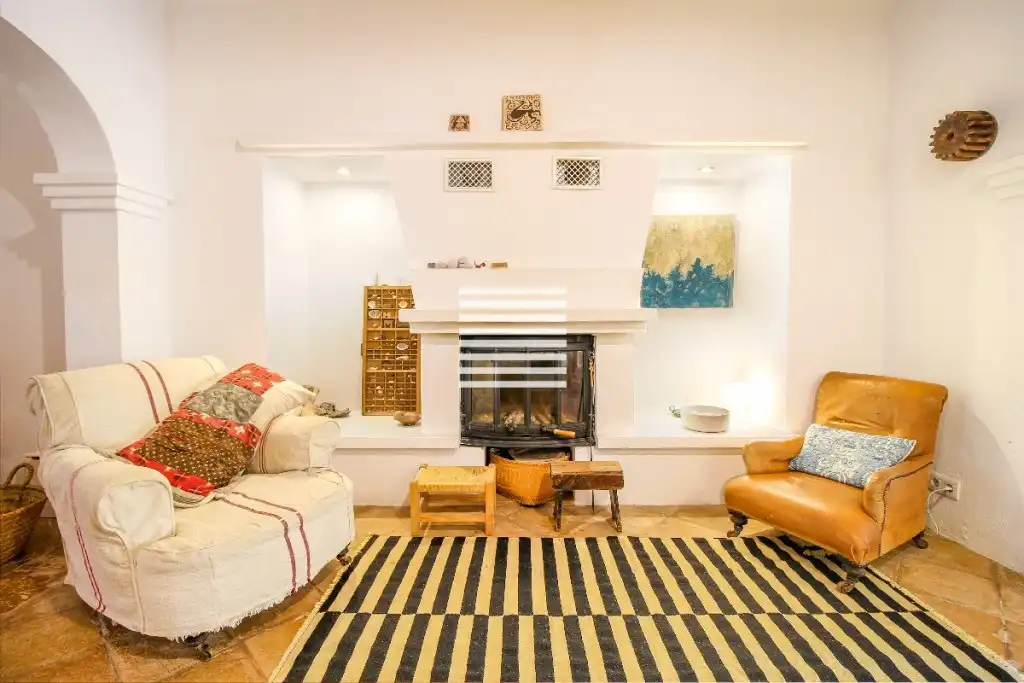 Sala de estar de Casa adosada en venta en Pollença con Aire acondicionado y Amueblado