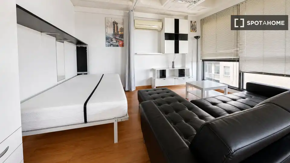 Sala de estar de Estudio para compartir en Sevilla con Aire acondicionado, Terraza y Amueblado