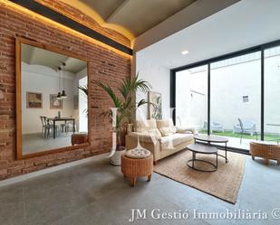 Living room of Planta baja for sale in Terrassa  with Air Conditioner, Heating and Terrace