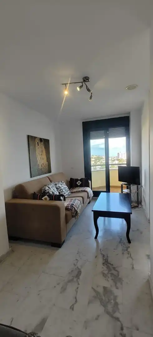 Sala d'estar de Àtic en venda en Benalmádena amb Aire condicionat, Calefacció i Jardí privat