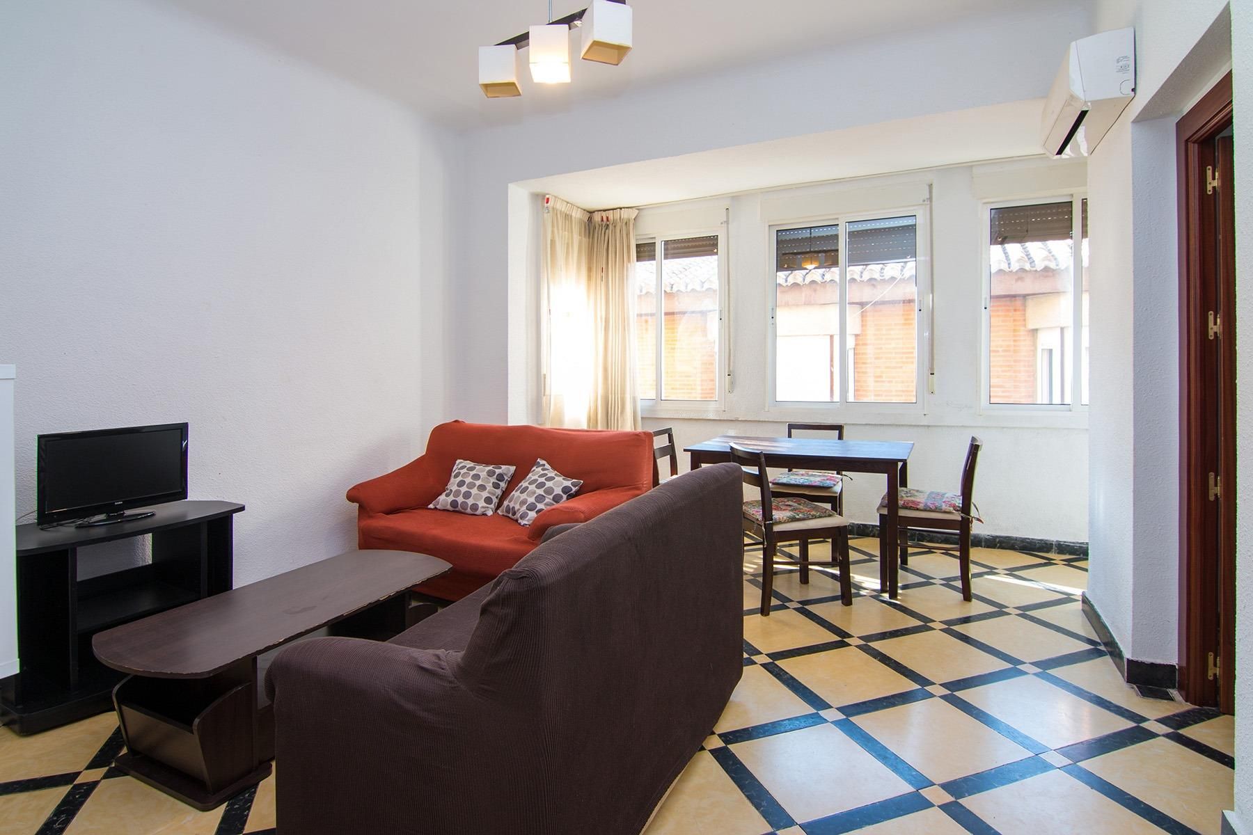 Living room of Flat for sale in  Granada Capital  with Air Conditioner