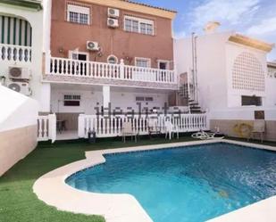 Exterior view of Single-family semi-detached for sale in Málaga Capital  with Air Conditioner, Terrace and Swimming Pool