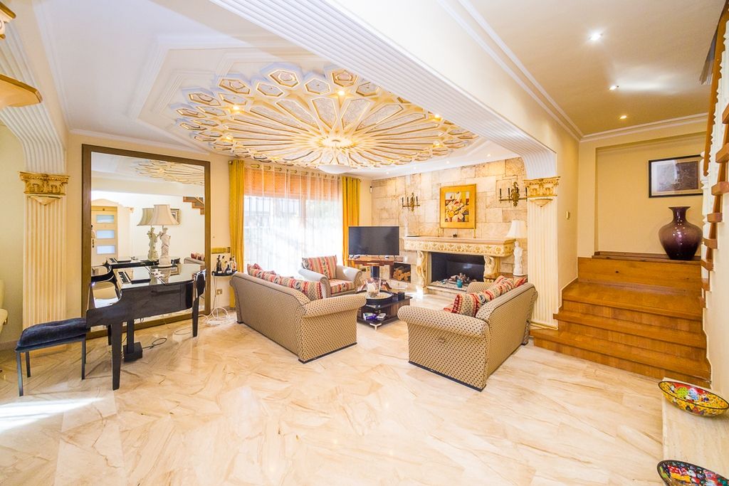 Living room of Single-family semi-detached for sale in Castell d'Aro, Platja d'Aro i s'Agaró  with Air Conditioner, Heating and Private garden