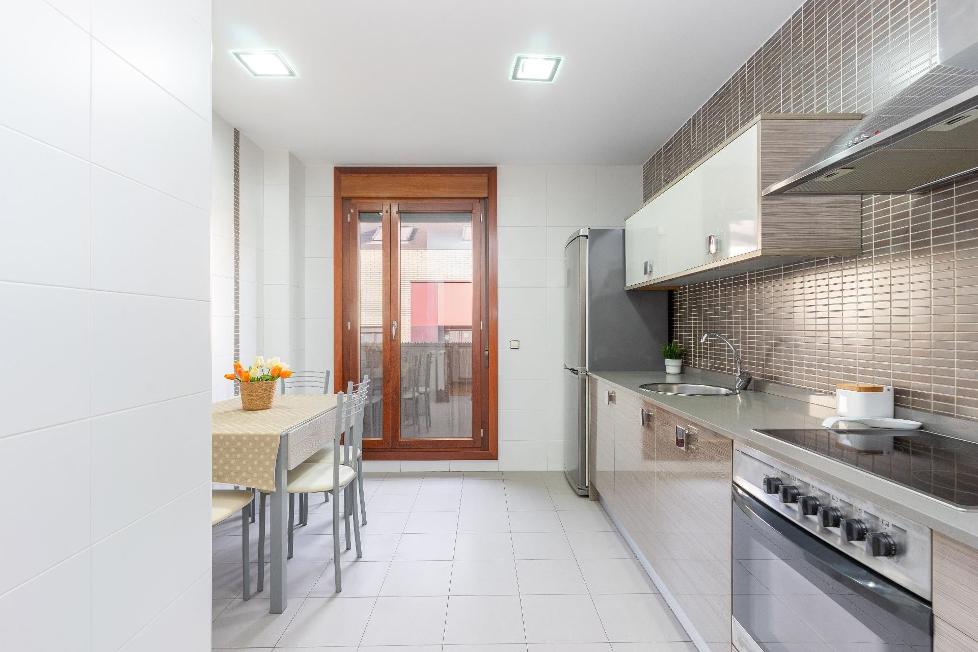 Kitchen of Flat for sale in Gijón   with Heating, Terrace and Storage room