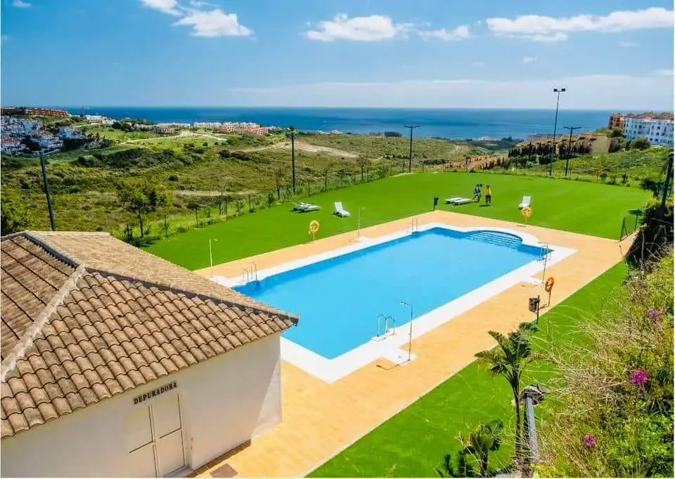 Swimming pool of Flat for sale in Manilva  with Air Conditioner, Heating and Terrace