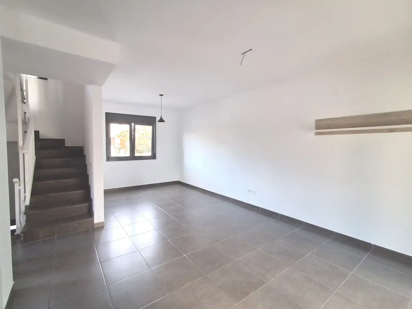 Sala de estar de Casa adosada en venta en Mont-roig del Camp con Aire acondicionado, Jardín privado y Terraza